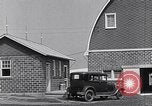 Image of Farmer in 1929 Ford Model A Tudor United States USA, 1930, second 20 stock footage video 65675036976
