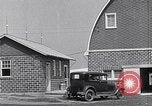 Image of Farmer in 1929 Ford Model A Tudor United States USA, 1930, second 22 stock footage video 65675036976
