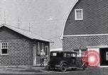 Image of Farmer in 1929 Ford Model A Tudor United States USA, 1930, second 30 stock footage video 65675036976