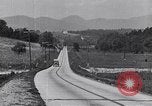 Image of early highways in America United States USA, 1932, second 10 stock footage video 65675036981