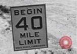 Image of signs on American highways United States USA, 1932, second 8 stock footage video 65675036982