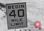 Image of signs on American highways United States USA, 1932, second 9 stock footage video 65675036982
