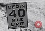 Image of signs on American highways United States USA, 1932, second 10 stock footage video 65675036982