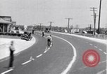 Image of signs on American highways United States USA, 1932, second 13 stock footage video 65675036982