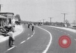 Image of signs on American highways United States USA, 1932, second 14 stock footage video 65675036982