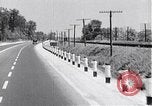 Image of signs on American highways United States USA, 1932, second 18 stock footage video 65675036982