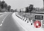 Image of signs on American highways United States USA, 1932, second 22 stock footage video 65675036982