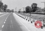 Image of signs on American highways United States USA, 1932, second 26 stock footage video 65675036982