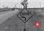 Image of signs on American highways United States USA, 1932, second 42 stock footage video 65675036982