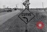 Image of signs on American highways United States USA, 1932, second 43 stock footage video 65675036982