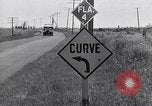Image of signs on American highways United States USA, 1932, second 44 stock footage video 65675036982