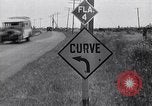 Image of signs on American highways United States USA, 1932, second 46 stock footage video 65675036982