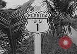 Image of signs on American highways United States USA, 1932, second 47 stock footage video 65675036982