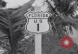 Image of signs on American highways United States USA, 1932, second 49 stock footage video 65675036982