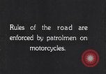 Image of signs on American highways United States USA, 1932, second 58 stock footage video 65675036982