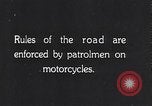 Image of signs on American highways United States USA, 1932, second 59 stock footage video 65675036982