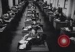 Image of workers arriving for jobs in city New York City USA, 1939, second 56 stock footage video 65675036990