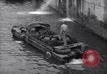 Image of DUKW amphibious vehicle Salerno Italy, 1943, second 50 stock footage video 65675036996
