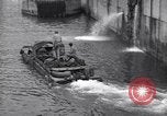 Image of DUKW amphibious vehicle Salerno Italy, 1943, second 55 stock footage video 65675036996