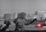 Image of load material into DUKW amphibious vehicle Naples Italy, 1943, second 8 stock footage video 65675036999