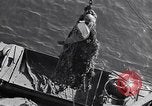 Image of load material into DUKW amphibious vehicle Naples Italy, 1943, second 16 stock footage video 65675036999