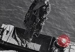 Image of load material into DUKW amphibious vehicle Naples Italy, 1943, second 17 stock footage video 65675036999