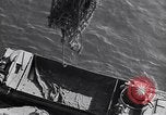 Image of load material into DUKW amphibious vehicle Naples Italy, 1943, second 18 stock footage video 65675036999
