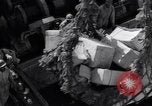 Image of load material into DUKW amphibious vehicle Naples Italy, 1943, second 25 stock footage video 65675036999