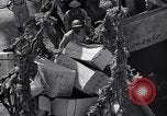 Image of load material into DUKW amphibious vehicle Naples Italy, 1943, second 27 stock footage video 65675036999