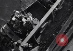 Image of load material into DUKW amphibious vehicle Naples Italy, 1943, second 44 stock footage video 65675036999