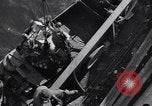 Image of load material into DUKW amphibious vehicle Naples Italy, 1943, second 45 stock footage video 65675036999