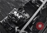 Image of load material into DUKW amphibious vehicle Naples Italy, 1943, second 51 stock footage video 65675036999