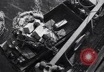 Image of load material into DUKW amphibious vehicle Naples Italy, 1943, second 54 stock footage video 65675036999