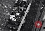 Image of load material into DUKW amphibious vehicle Naples Italy, 1943, second 58 stock footage video 65675036999
