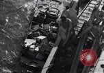 Image of load material into DUKW amphibious vehicle Naples Italy, 1943, second 61 stock footage video 65675036999
