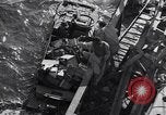 Image of load material into DUKW amphibious vehicle Naples Italy, 1943, second 62 stock footage video 65675036999
