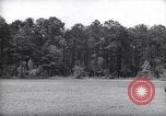 Image of farmer plows farm on tractor Savannah Georgia USA, 1939, second 1 stock footage video 65675037006