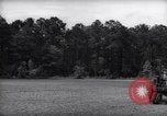 Image of farmer plows farm on tractor Savannah Georgia USA, 1939, second 5 stock footage video 65675037006