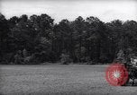 Image of farmer plows farm on tractor Savannah Georgia USA, 1939, second 6 stock footage video 65675037006