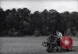Image of farmer plows farm on tractor Savannah Georgia USA, 1939, second 12 stock footage video 65675037006