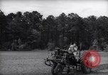 Image of farmer plows farm on tractor Savannah Georgia USA, 1939, second 14 stock footage video 65675037006