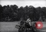 Image of farmer plows farm on tractor Savannah Georgia USA, 1939, second 15 stock footage video 65675037006