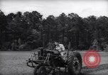 Image of farmer plows farm on tractor Savannah Georgia USA, 1939, second 16 stock footage video 65675037006