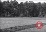 Image of farmer plows farm on tractor Savannah Georgia USA, 1939, second 25 stock footage video 65675037006