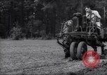 Image of farmer plows farm on tractor Savannah Georgia USA, 1939, second 28 stock footage video 65675037006