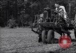 Image of farmer plows farm on tractor Savannah Georgia USA, 1939, second 30 stock footage video 65675037006