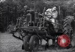 Image of farmer plows farm on tractor Savannah Georgia USA, 1939, second 32 stock footage video 65675037006