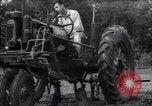 Image of farmer plows farm on tractor Savannah Georgia USA, 1939, second 34 stock footage video 65675037006