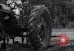 Image of farmer plows farm on tractor Savannah Georgia USA, 1939, second 36 stock footage video 65675037006