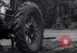 Image of farmer plows farm on tractor Savannah Georgia USA, 1939, second 37 stock footage video 65675037006
